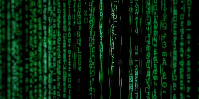 Ecranul unui calculator plin de caractere ciudate verzi, ca in filmul Matrix